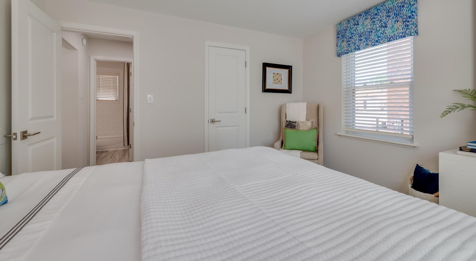 Relax and recharge in beautiful and spacious bedrooms furnished bedroom with window