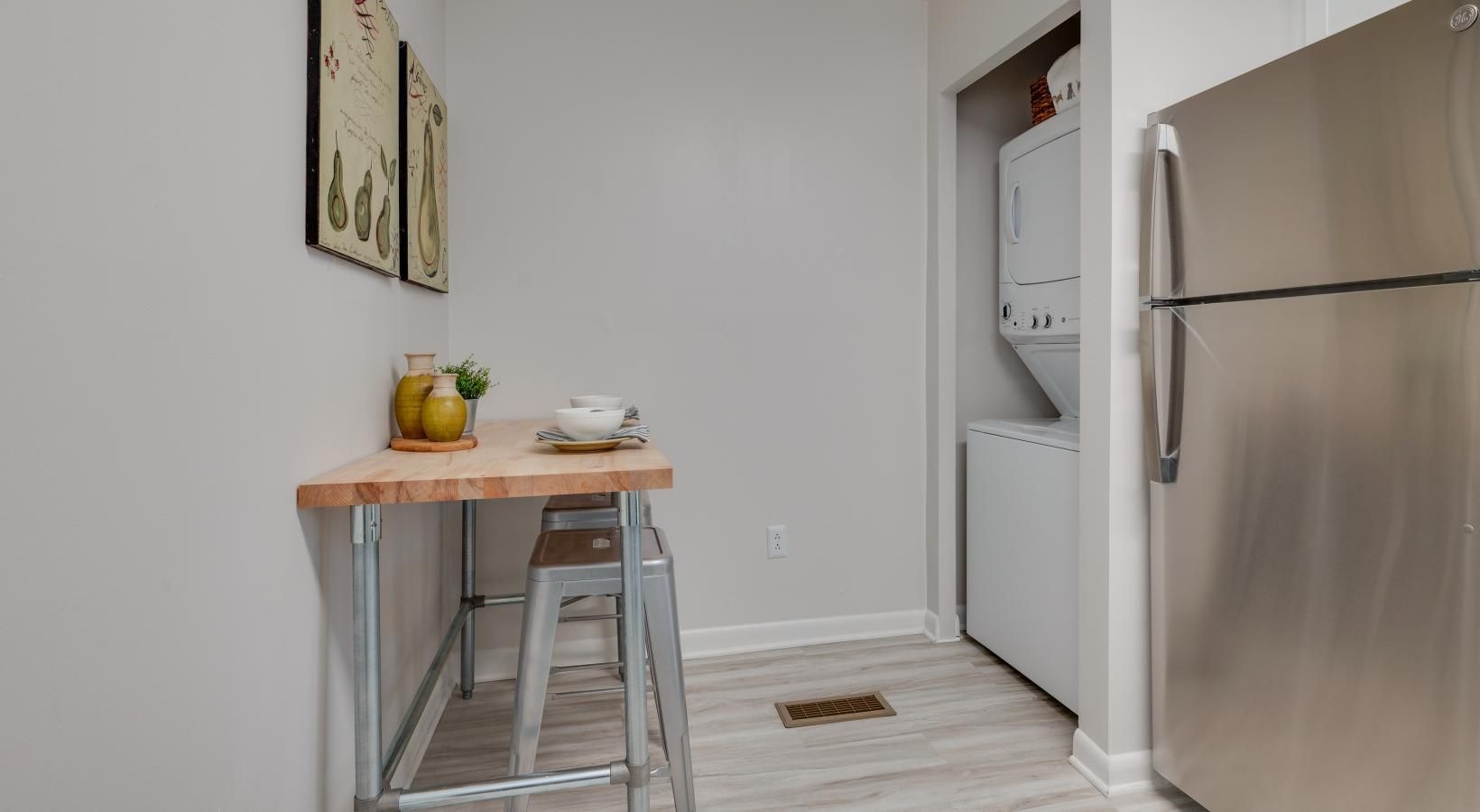 We've got your laundry sorted stacked washer/dryer units in kitchen niche