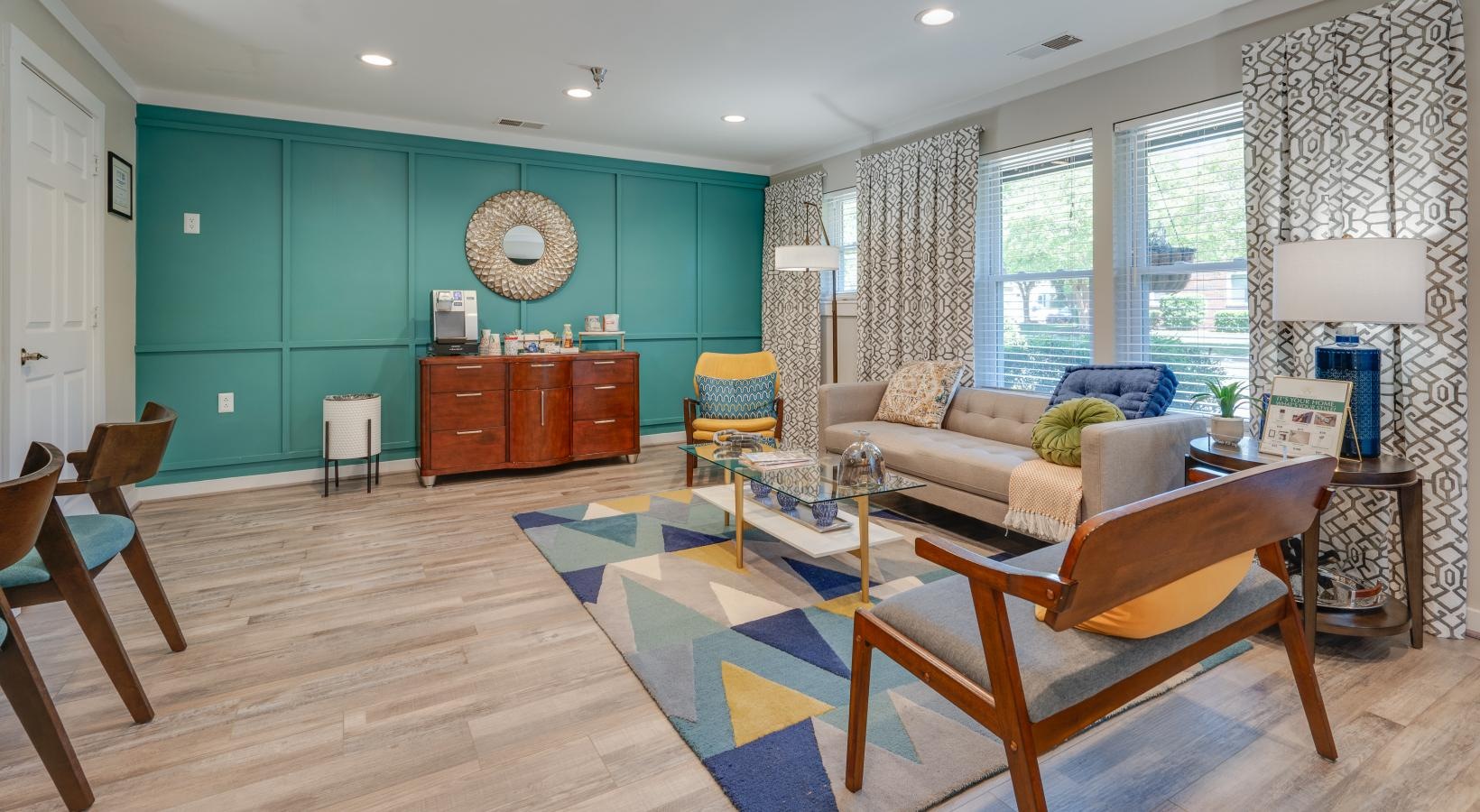 The essence of exceptional living well lit, furnished clubhouse